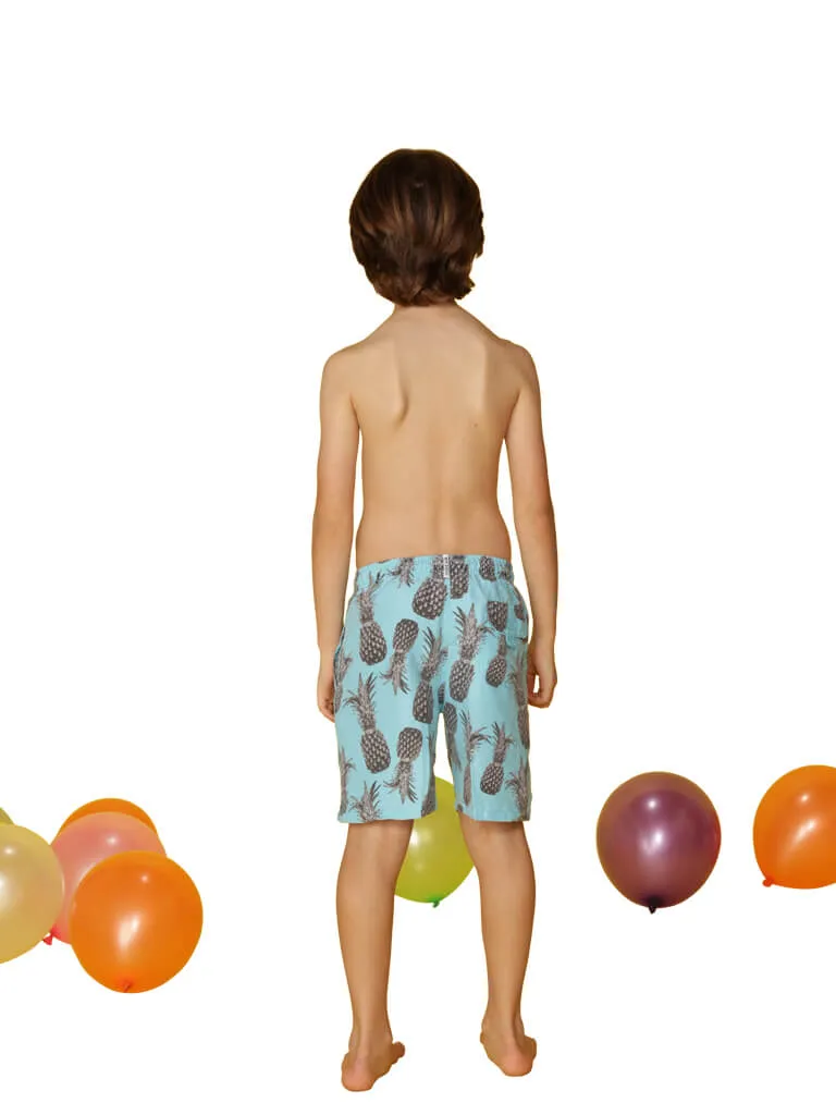 Boys Swim Trunks printed in a spray of pineapples